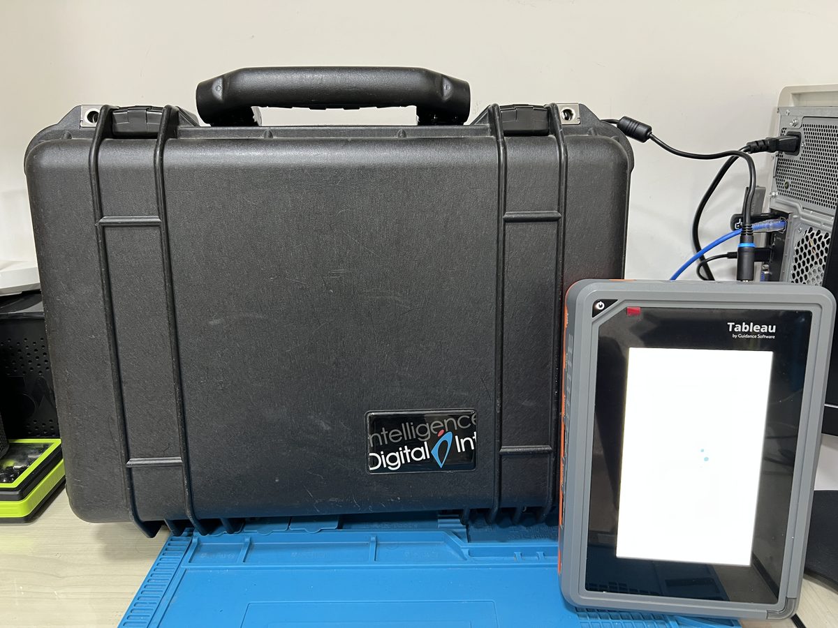 Tableau TX1 forensic imager powering up next to its field transport case